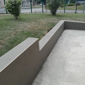 Photo de galerie - Muret, parpaings et enduit ciment 