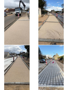 Photo de galerie - Création de places de parking en pavés : décaissement, lit de sable stabilisé compacté, pose alignée des pavés, bordures béton et massifs plantables en périphérie. Travail soigné et sécurisé.