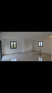 Photo de galerie - Maison neuve salon apres peinture fini