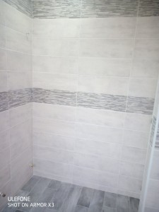 Photo de galerie - Carrelage mur et sol d'une salle de bain
