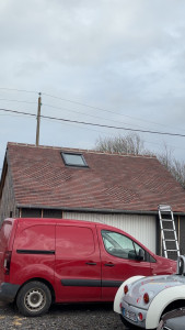 Photo de galerie - Construction d’un garage en ossature bois avec la couverture en tuile plate et pose d’un velux 
