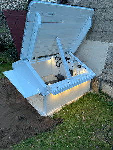 Photo de galerie - Installations robots de tonte avec création d’un garage automatique 