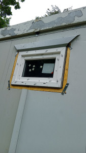 Photo de galerie - Pause d'encadrement de contours de fenêtre.