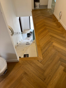 Photo de galerie - Réalisation d'un sol parquet.

