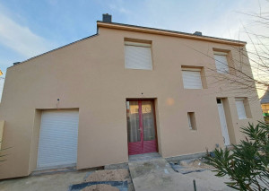 Photo de galerie - Réalisation d’un enduit de façade avec son ITE