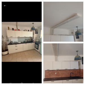Photo de galerie - Pose de credence en carrelage de 10×10 et réalisation au plafond d'un coffre en ba13 afin de masquer une ancienne séparation