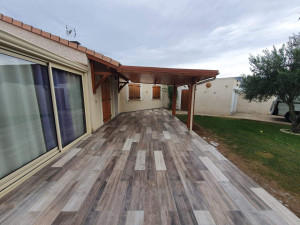 Photo de galerie - Terrasse imitation parquet 