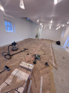 Photo de galerie - Pose parquet coller