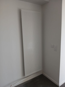 Photo de galerie - Pose radiateur dans un séjour 