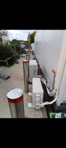 Photo de galerie - Pose groupe ext clim pour utisation boutique pendant travaux 