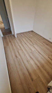 Photo de galerie - Pose sol stratifié dans une chambre 