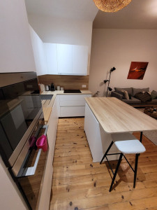 Photo de galerie - Cuisine équipée sur-mesure. 