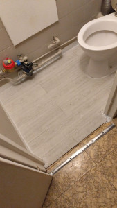 Photo de galerie - Posé sol stratifié adhésif 