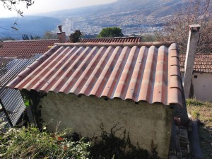 Photo de galerie - Rénovation toiture abri de jardin en panneau Éternit
