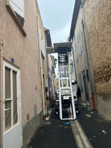 Photo de galerie - Passage machine a laver par fenêtres, petit impasse 