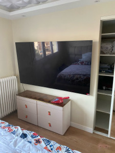 Photo de galerie - Fixation tv grande taille sur murs pleins 