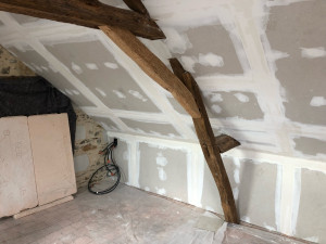 Photo de galerie - Isolation comble poutres apparentes