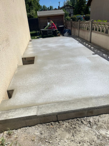 Photo de galerie - Création d'une dalle pour recevoir un futur garage en ossature bois