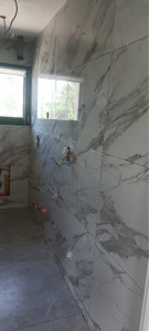 Photo de galerie - Pose de carrelage sur un mur 