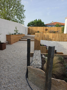 Photo de galerie - Aménagement bois et minéral 