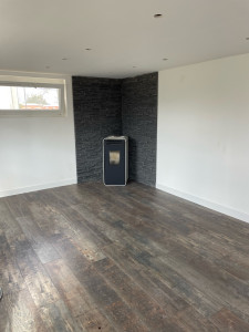 Photo de galerie - Pose parquet .pose poêle à pellets .pose pierre murale 