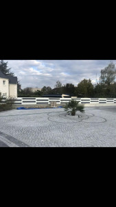 Photo de galerie - Realisation de terrasse en pavé granit