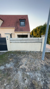 Photo de galerie - Rehausse d’un mur en parpaings sur deux rangs