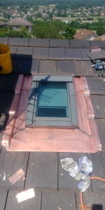 Photo de galerie - Changement de garniture fenêtre de toit sur tuile 