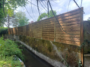 Photo de galerie - Pose panneaux occultants 
