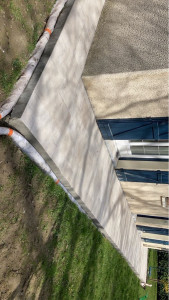 Photo de galerie - Réalisation dalle + carrelage autours d’une maison + mise en place des drains 