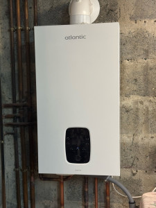 Photo de galerie - Chaudière atlantic naema 30kw production eau chaude et chauffage 