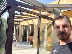Photo de galerie - Une véranda sur mesure avec toit vitré 