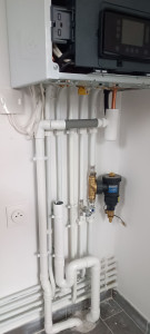 Photo de galerie - Remontés de chaudière condensation avec pose d'un filtre anti-boue