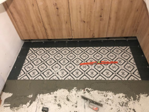 Photo de galerie - Pose de carrelage sol ✔ Carrelage décoratif / effet tapis ✔ Alignement précis et join