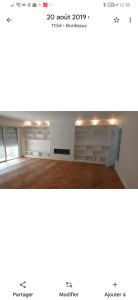 Photo de galerie - Appartement, entièrement rénové, murs plafond, cheminée électrique, bibliothèque chene +éclairage, plancher bois, collé, peinture. 