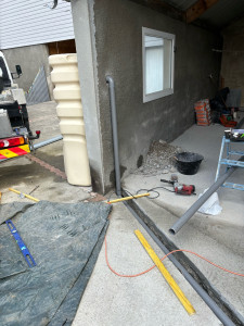 Photo de galerie - Pause récupérateur d’eau, avec un caniveau et un regard 