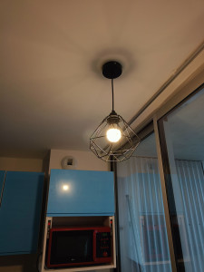 Photo de galerie - Pose d'un luminaire. 