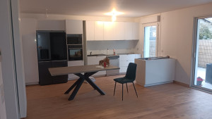 Photo de galerie - Renovation complète d'une maison avec une ouverture sur mur porteur, sol, peinture et cuisine 