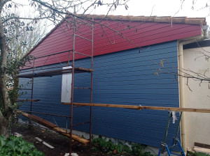 Photo de galerie - Réalisation d'un bardage bois.
