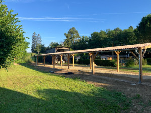 Photo de galerie - Fabrication et pose d’un Carports de 100 m² en charpente traditionnel et couverture fibro ciment