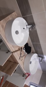 Photo de galerie - Installation meuble double vasque. 