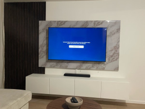 Photo de galerie - Installation meuble tv