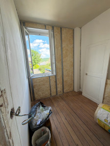 Photo de galerie - Réalisation d'une isolation thermique plus ossature avent le Placo