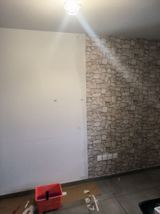 Photo de galerie - Pose de papier peint.