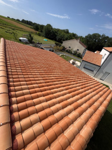 Photo de galerie - Réalisation d'une couverture en tuiles romanes, alliant rigueur esthétique , 