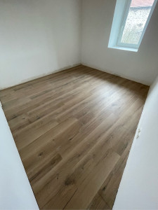 Photo de galerie - Pose de parquet dans une chambre