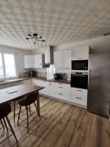 Photo de galerie - Pose du sol tapisserie faïence et cuisine 