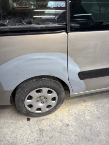 Photo de galerie - Réparation aile arrière et porte 