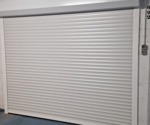 Photo de galerie - Pose fourniture et motorisation porte de garage