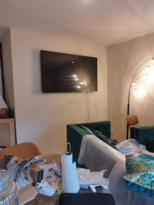 Photo de galerie - Fixation tv au mur